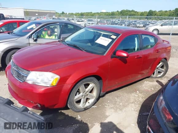 2010 Dodge Avenger R/T with VIN 1B3CC5FVXAN129678, listed as a IAAI auction lot 40311875 with 125,422 mi miles and . Bid and sale history available at DreamBid. Image 2.