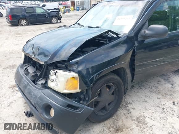 ✅ 2002 GMC Envoy SLE • VIN: 1GKDS13S522502142 • Лот: 42459243. Опубликован ранее на IAAI с пробегом 277 794 миль. Бесплатный доступ к архиву аукционных продаж из США и подробный отчёт об истории автомобиля на DreamBid. Изображение 6.