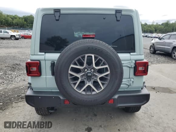 ✅ 2024 Jeep Wrangler Sahara • VIN: 1C4PJXEG9RW334127 • Lot: 69811845. Listed on Copart with 7,372 mi. Free auction sales archive from the USA and detailed vehicle history report at DreamBid. Image 6.