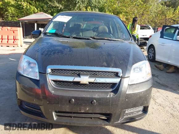 2007 Chevrolet Aveo LS z VIN KL1TD56667B098628, wystawiony jako IAAI lot #43324818 z przebiegiem 180 747 mil mil oraz . Historia ofert i sprzedaży dostępna na DreamBid. Obrazek 12.