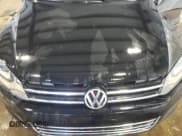 ✅ 2013 Volkswagen Touareg Lux • VIN: WVGEF9BP7DD007945 • Lot: 65758255. Listed on Copart with 90,086 mi. Free auction sales archive from the USA and detailed vehicle history report at DreamBid. Image 12.