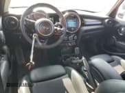 ✅ 2021 MINI Hardtop 4 Door Cooper S • VIN: WMWXU9C06M2N01629 • Lot: 65398605. Listed on Copart with 74,356 mi. Free auction sales archive from the USA and detailed vehicle history report at DreamBid. Image 8.