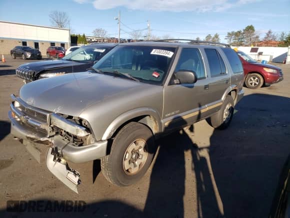 2002 Chevrolet Blazer LS z VIN 1GNDT13W92K149598, wystawiony jako Copart lot #81003394 z przebiegiem 154 972 mil mil oraz Szkoda całkowita • Salvage title. Historia ofert i sprzedaży dostępna na DreamBid. Obrazek 1.