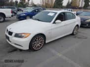 ✅ 2008 BMW 3 Series 335xi • VIN: WBAVD53508A283887 • Lot: 43884292. Listed on IAAI with 106,004 mi. Free auction sales archive from the USA and detailed vehicle history report at DreamBid. Image 2.