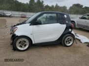 ✅ 2016 Smart fortwo Prime • VIN: WMEFJ5DA4GK054621 • Lot: 68703105. Wystawiony na Copart z przebiegiem 70 845 mil. Bezpłatny archiwum sprzedaży aukcyjnych z USA i szczegółowy raport historii pojazdu na DreamBid. Zdjęcie 1.
