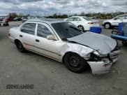 ✅ 1997 Toyota Corolla • VIN: 2T1BA02E0VC217799 • Лот: 91002915. Опубликован ранее на Copart с пробегом 157 577 миль. Бесплатный доступ к архиву аукционных продаж из США и подробный отчёт об истории автомобиля на DreamBid. Изображение 14.