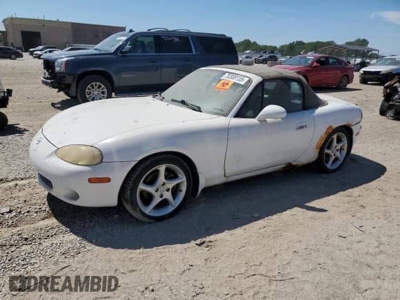 ✅ 2003 Mazda MX-5 Miata Cloth • VIN: JM1NB353430300701 • Лот: 70308155. Опубликован ранее на Copart с пробегом Не указан. Бесплатный доступ к архиву аукционных продаж из США и подробный отчёт об истории автомобиля на DreamBid. Изображение 1.