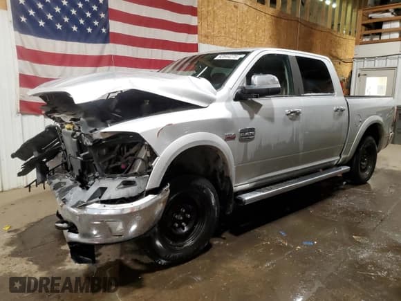 ✅ 2015 Ram 1500 Laramie Longhorn • VIN: 1C6RR7PT4FS509941 • Лот: 92844275. Опубликован ранее на Copart с пробегом 126 978 миль. Бесплатный доступ к архиву аукционных продаж из США и подробный отчёт об истории автомобиля на DreamBid. Изображение 1.