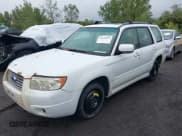 ✅ 2007 Subaru Forester X • VIN: JF1SG65667H710736 • Lot: 43244105. Listed on IAAI with 199,681 mi. Free auction sales archive from the USA and detailed vehicle history report at DreamBid. Image 2.