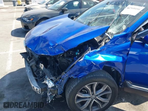 ✅ 2020 Honda CR-V Touring • VIN: 7FARW1H97LE011473 • Lot: 42368050. Listed on IAAI with 84,425 mi. Free auction sales archive from the USA and detailed vehicle history report at DreamBid. Image 6.