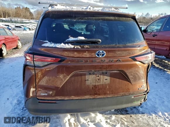 ✅ 2021 Toyota Sienna LE • VIN: 5TDKSKFC7MS015498 • Lot: 93909305. Listed on Copart with 88,904 mi. Free auction sales archive from the USA and detailed vehicle history report at DreamBid. Image 6.