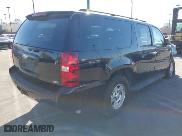 ✅ 2007 Chevrolet Suburban LT • VIN: 3GNFC16077G248080 • Lot: 41289912. Listed on IAAI with 129,622 mi. Free auction sales archive from the USA and detailed vehicle history report at DreamBid. Image 4.