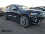✅ 2015 Jeep Grand Cherokee Overland • VIN: 1C4RJFCMXFC618455 • Lot: 80548554. Listed on Copart with 175,413 mi. Free auction sales archive from the USA and detailed vehicle history report at DreamBid. Image 4.