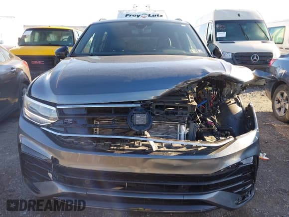 ✅ 2024 Volkswagen Tiguan SE R-Line Black • VIN: 3VV8B7AX6RM180825 • Лот: 43416735. Опубликован ранее на IAAI с пробегом 14 178 миль. Бесплатный доступ к архиву аукционных продаж из США и подробный отчёт об истории автомобиля на DreamBid. Изображение 12.