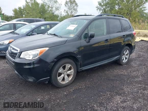 2015 Subaru Forester Premium with VIN JF2SJADCXFG543826, listed as a IAAI auction lot 43306662 with 165,478 mi miles and . Bid and sale history available at DreamBid. Image 2.