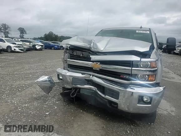 ✅ 2015 Chevrolet Silverado 2500HD LTZ • VIN: 1GC1KWE88FF106976 • Lot: 82219705. Listed on Copart with 149,611 mi. Free auction sales archive from the USA and detailed vehicle history report at DreamBid. Image 14.