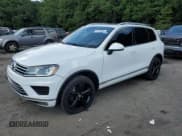 ✅ 2017 Volkswagen Touareg Wolfsburg Edition • VIN: WVGRF7BP5HD006885 • Lot: 64736685. Wystawiony na Copart z przebiegiem 133 348 mil. Bezpłatny archiwum sprzedaży aukcyjnych z USA i szczegółowy raport historii pojazdu na DreamBid. Zdjęcie 1.