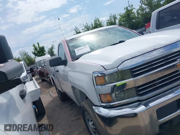 ✅ 2015 Chevrolet Silverado 2500HD Work Truck • VIN: 1GB0CUEG4FZ520926 • Лот: 42908718. Опубликован ранее на IAAI с пробегом 203 518 миль. Бесплатный доступ к архиву аукционных продаж из США и подробный отчёт об истории автомобиля на DreamBid. Изображение 1.