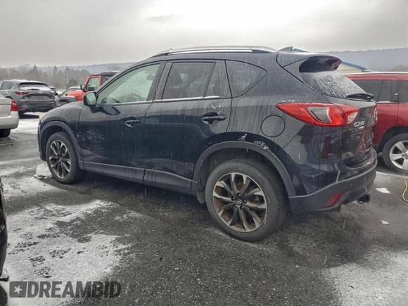 ✅ 2016 Mazda CX-5 Grand Touring • VIN: JM3KE4DY9G0886287 • Lot: 96258785. Wystawiony na Copart z przebiegiem 136 186 mil. Bezpłatny archiwum sprzedaży aukcyjnych z USA i szczegółowy raport historii pojazdu na DreamBid. Zdjęcie 2.