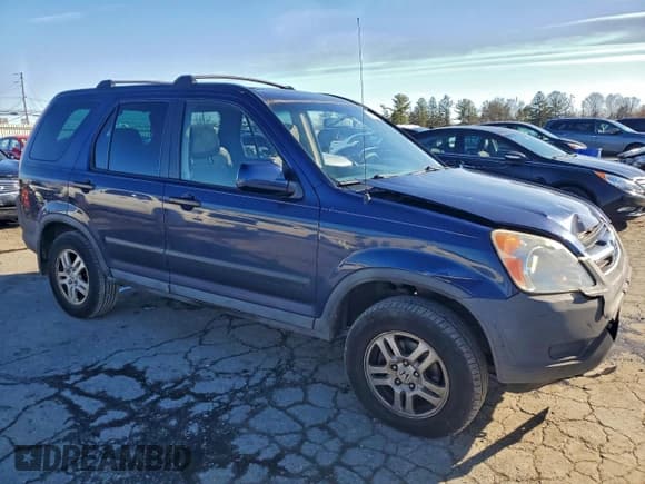 ✅ 2003 Honda CR-V EX • VIN: SHSRD78813U153564 • Lot: 95181825. Listed on Copart with 233,934 mi. Free auction sales archive from the USA and detailed vehicle history report at DreamBid. Image 4.