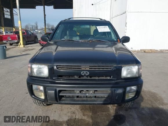 ✅ 1999 Infiniti QX4 • VIN: JNRAR05Y3XW047670 • Lot: 43757053. Listed on IAAI with 142,059 mi. Free auction sales archive from the USA and detailed vehicle history report at DreamBid. Image 6.