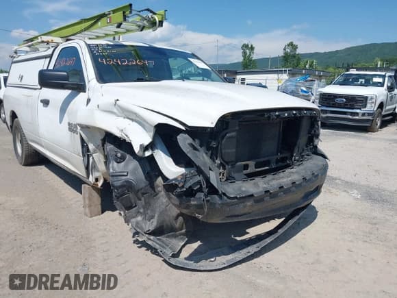 ✅ 2014 Ram 1500 Tradesman • VIN: 3C6JR7DT1EG278102 • Lot: 42422647. Listed on IAAI with 118,797 mi. Free auction sales archive from the USA and detailed vehicle history report at DreamBid. Image 6.