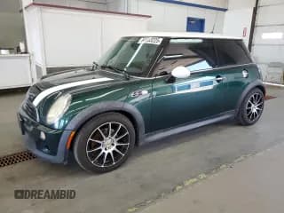 ✅ 2005 MINI Hardtop S • VIN: WMWRE33575TG97433 • Lot: 64603225. Listed on Copart with 82,040 mi. Free auction sales archive from the USA and detailed vehicle history report at DreamBid. Image 1.