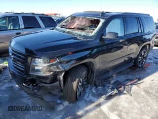 2020 Chevrolet Tahoe Premier z VIN 1GNSKCKJ5LR169805, wystawiony jako Copart lot #88970235 z przebiegiem 65 854 mil mil oraz Szkoda całkowita • Salvage title. Historia ofert i sprzedaży dostępna na DreamBid. Obrazek 1.