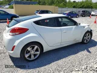 2013 Hyundai Veloster w/Gray Int с VIN KMHTC6AD8DU132894, выставлен на аукционе Copart как лот 58910604 с пробегом 128 753 миль миль и Списание • Salvage title. История ставок и продаж доступна на DreamBid. Изображение 3.