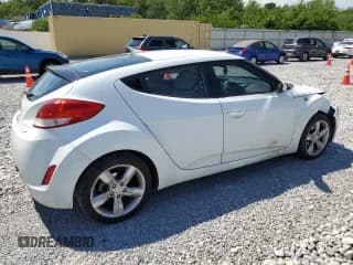 ✅ 2013 Hyundai Veloster w/Gray Int • VIN: KMHTC6AD8DU132894 • Lot: 58910604. Listed on Copart with 128,753 mi. Free auction sales archive from the USA and detailed vehicle history report at DreamBid. Image 3.