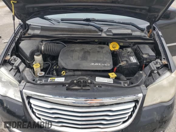 ✅ 2014 Chrysler Town & Country Touring • VIN: 2C4RC1BG7ER160694 • Лот: 81510195. Опубликован ранее на Copart с пробегом 118 613 миль. Бесплатный доступ к архиву аукционных продаж из США и подробный отчёт об истории автомобиля на DreamBid. Изображение 12.