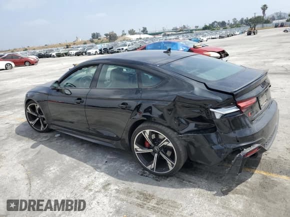 ✅ 2021 Audi RS 5 Sportback • VIN: WUAAWCF53MA904838 • Лот: 56450664. Опубликован ранее на Copart с пробегом 46 020 миль. Бесплатный доступ к архиву аукционных продаж из США и подробный отчёт об истории автомобиля на DreamBid. Изображение 2.