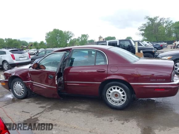 ✅ 1999 Buick Park Avenue • VIN: 1G4CW52K0X4601883 • Lot: 42170730. Listed on IAAI with 118,272 mi. Free auction sales archive from the USA and detailed vehicle history report at DreamBid. Image 15.