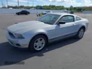 ✅ 2010 Ford Mustang V6 • VIN: 1ZVBP8AN0A5181714 • Lot: 43804738. Listed on IAAI with 165,867 mi. Free auction sales archive from the USA and detailed vehicle history report at DreamBid. Image 2.