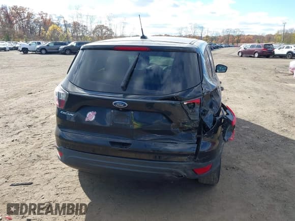 ✅ 2017 Ford Escape S • VIN: 1FMCU0F7XHUA26384 • Lot: 43631016. Listed on IAAI with 69,188 mi. Free auction sales archive from the USA and detailed vehicle history report at DreamBid. Image 18.