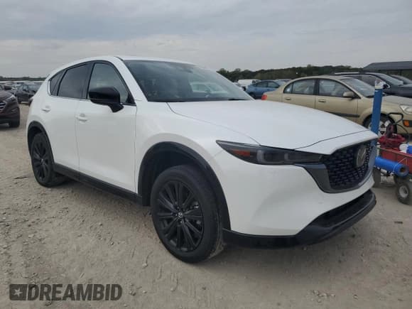 ✅ 2022 Mazda CX-5 2.5 Turbo • VIN: JM3KFBAY7N0604926 • Lot: 86640415. Listed on Copart with 31,096 mi. Free auction sales archive from the USA and detailed vehicle history report at DreamBid. Image 4.