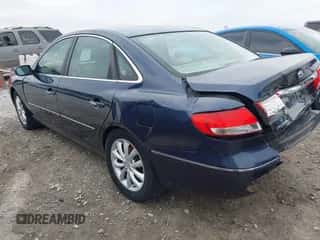2006 Hyundai Azera SE z VIN KMHFC46FX6A044039, wystawiony jako IAAI lot #41772618 z przebiegiem 158 657 mil mil oraz . Historia ofert i sprzedaży dostępna na DreamBid. Obrazek 3.