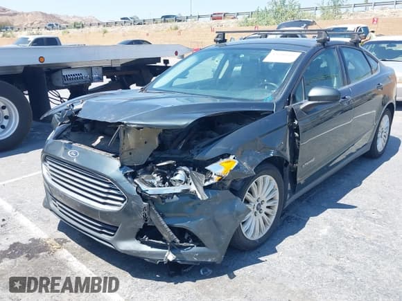 ✅ 2016 Ford Fusion S Hybrid • VIN: 3FA6P0UU2GR131952 • Lot: 42990600. Wystawiony na IAAI z przebiegiem 164 073 mil. Bezpłatny archiwum sprzedaży aukcyjnych z USA i szczegółowy raport historii pojazdu na DreamBid. Zdjęcie 6.