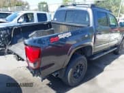 ✅ 2021 Toyota Tacoma SR • VIN: 3TMCZ5AN4MM449310 • Lot: 42527596. Listed on IAAI with 23,211 mi. Free auction sales archive from the USA and detailed vehicle history report at DreamBid. Image 4.