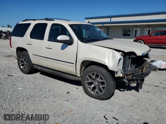 ✅ 2012 GMC Yukon SLT • VIN: 1GKS2DE02CR101001 • Lot: 86165685. Listed on Copart with 205,616 mi. Free auction sales archive from the USA and detailed vehicle history report at DreamBid. Image 4.