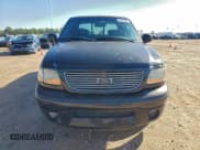 ✅ 2003 Ford F-150 Harley-Davidson • VIN: 1FTRW07343KD83293 • Lot: 94547995. Listed on Copart with 176,233 mi. Free auction sales archive from the USA and detailed vehicle history report at DreamBid. Image 5.