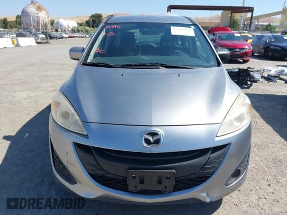 ✅ 2012 Mazda 5 Sport • VIN: JM1CW2BL9C0117627 • Lot: 42403991. Listed on IAAI with 124,239 mi. Free auction sales archive from the USA and detailed vehicle history report at DreamBid. Image 13.