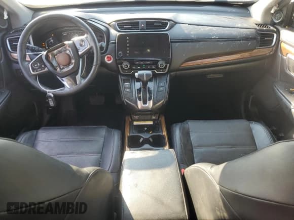 ✅ 2020 Honda CR-V Touring • VIN: 7FARW1H97LE019055 • Лот: 63650575. Опубликован ранее на Copart с пробегом 127 256 миль. Бесплатный доступ к архиву аукционных продаж из США и подробный отчёт об истории автомобиля на DreamBid. Изображение 8.