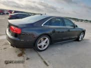 ✅ 2013 Audi S8 • VIN: WAUD2AFD6DN018102 • Lot: 61791535. Listed on Copart with 140,751 mi. Free auction sales archive from the USA and detailed vehicle history report at DreamBid. Image 3.