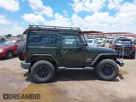 ✅ 2012 Jeep Wrangler Sahara • VIN: 1C4AJWBGXCL100527 • Lot: 42394623. Wystawiony na IAAI z przebiegiem 126 097 mil. Bezpłatny archiwum sprzedaży aukcyjnych z USA i szczegółowy raport historii pojazdu na DreamBid. Zdjęcie 13.