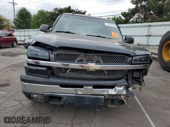 2005 Chevrolet Silverado 1500 Z71 z VIN 2GCEK19B351321259, wystawiony jako Copart lot #72497374 z przebiegiem 242 688 mil mil oraz Szkoda całkowita • Salvage title. Historia ofert i sprzedaży dostępna na DreamBid. Obrazek 5.