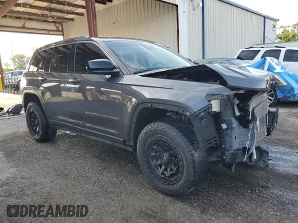 2022 Jeep Grand Cherokee Altitude with VIN 1C4RJGAG6N8589234, listed as a Copart auction lot 52606285 with 50,972 mi miles and Non repairable. Bid and sale history available at DreamBid. Image 4.