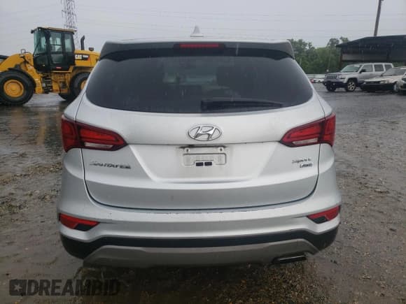 ✅ 2017 Hyundai Santa Fe 2.4L • VIN: 5XYZTDLB7HG438832 • Лот: 56296393. Опубликован ранее на Copart с пробегом 99 528 миль. Бесплатный доступ к архиву аукционных продаж из США и подробный отчёт об истории автомобиля на DreamBid. Изображение 6.