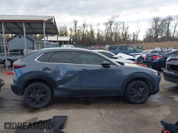 ✅ 2022 Mazda CX-30 S Carbon Edition • VIN: 3MVDMBCL0NM458115 • Lot: 41223224. Listed on IAAI with 67,066 mi. Free auction sales archive from the USA and detailed vehicle history report at DreamBid. Image 13.