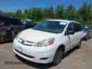 2009 Toyota Sienna LE with VIN 5TDBK23C09S024815, listed as a IAAI auction lot 42414365 with 254,522 mi miles and . Bid and sale history available at DreamBid. Image 2.